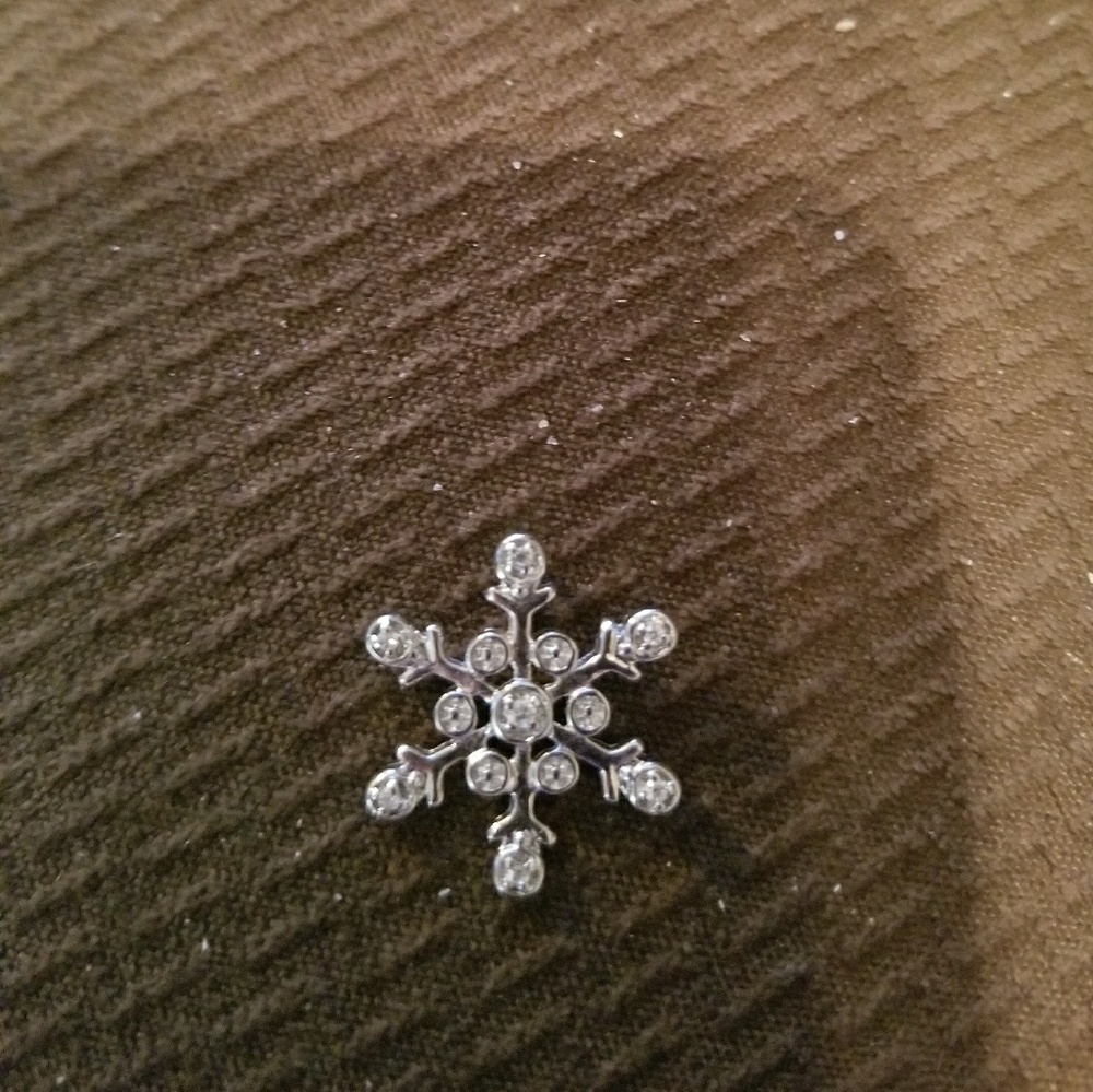 Sterling silver snowflake charm